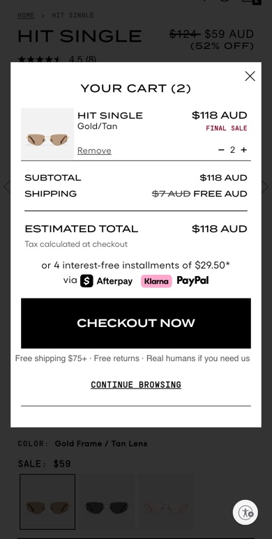 Quay cart, tested version: Adds shipping, returns and support reassurance by the checkout button.